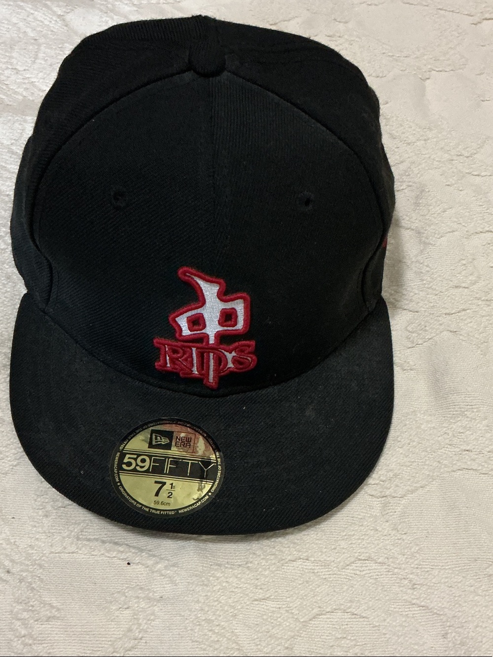 New Era Black Hat with Red and White RIPS Embroidery
